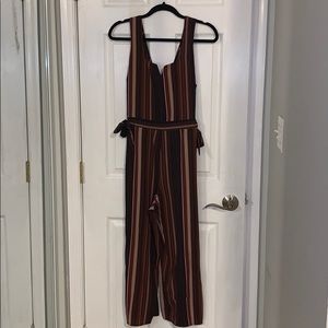 Striped jumpsuit with low back and tie sides